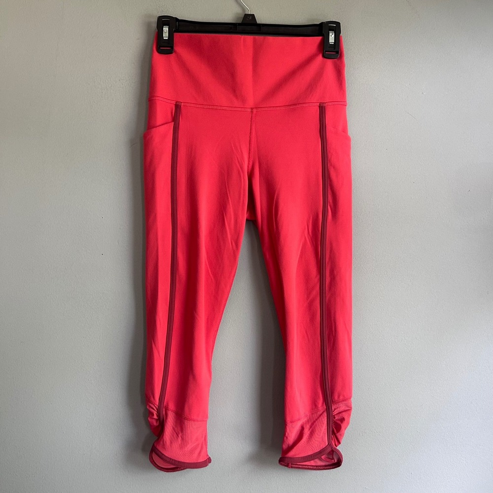 Athleta Salutation Stash Pocket II Capri Coral Red Yoga Leggings S 980309-01